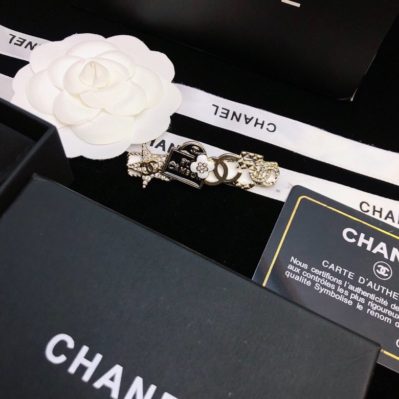 Ch*el brooches